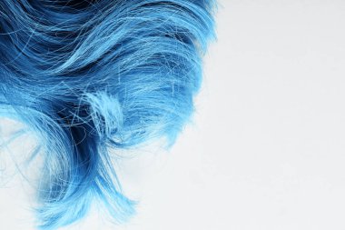 Top view of colored blue hair isolated on white clipart