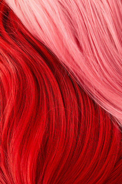 Top view of colored red and pink hair 