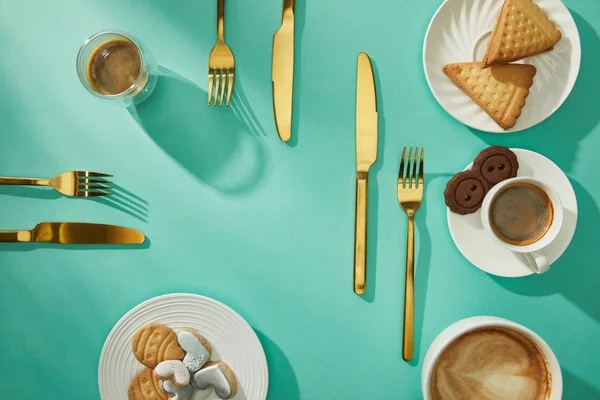Top View Sweet Cookies Coffee Golden Cutlery Turquoise Background — 스톡 사진