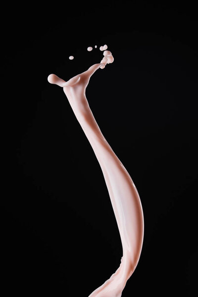 smooth fresh pink milk splash isolated on black