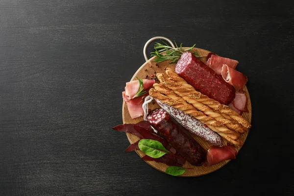 Top View Delicious Meat Platter Served Breadsticks Herbs Board Wooden — Stock Photo, Image