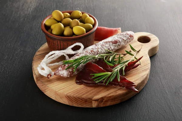 Delicious Meat Platter Served Olives Board Black Surface — Stock Photo, Image