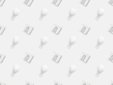 Beyaz üzerinde izole edilmiş küçük yay ve hava balonları figürlerinin üst görüntüsü 