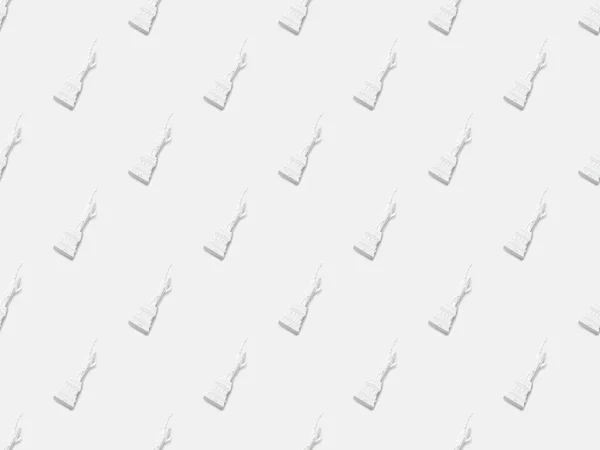 top view of small statue of liberty isolated on white 