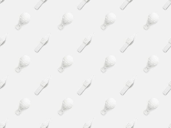 top view of big ben tower and air balloons figurines isolated on white 