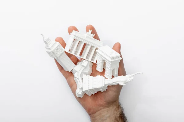Top View Man Holding Small Figurines Europe Isolated White — 스톡 사진