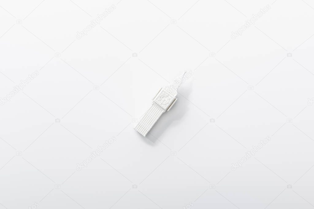 top view of small big ben tower figurine isolated on white 