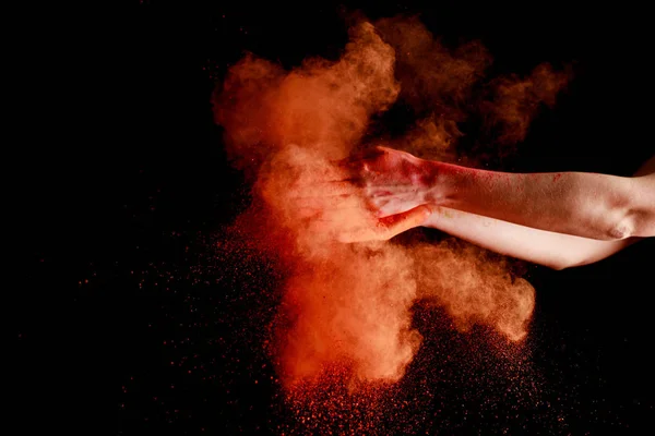 Vrouwelijke Handen Buurt Van Oranje Kleurrijke Holi Verf Explosie Zwarte — Stockfoto