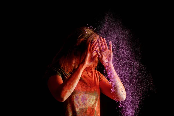 Woman Covering Face Violet Colorful Holi Paint Cloud Black Background — 스톡 사진