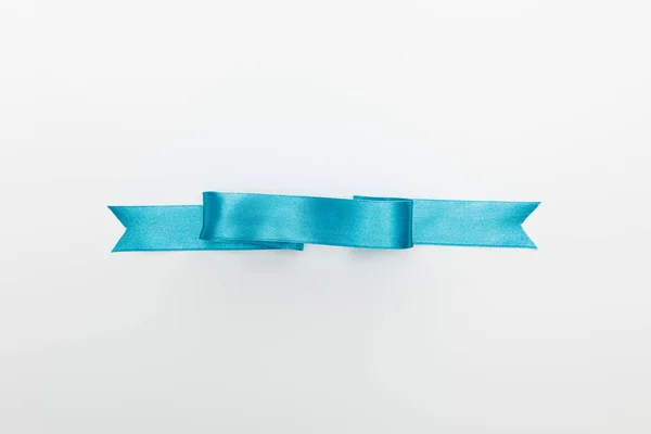 Vista Superior Fita Cetim Decorativo Azul Isolado Branco — Fotografia de Stock