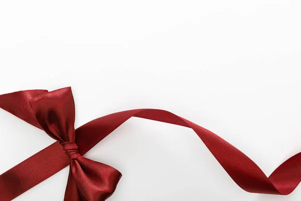 Top View Satin Burgundy Decorative Curved Ribbon Bow Isolated White — 스톡 사진