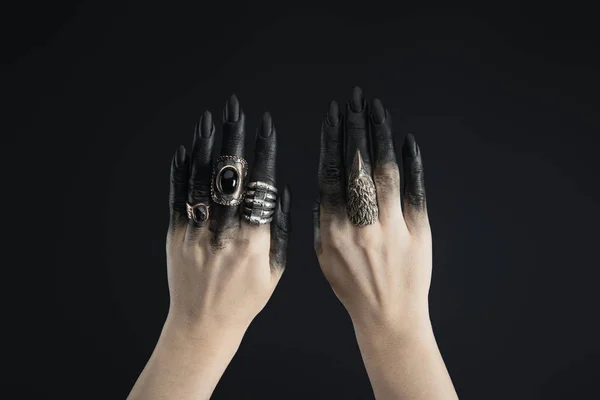 Cropped View Black Painted Hands Witch Jewelry Rings Isolated Black — Stock Photo, Image