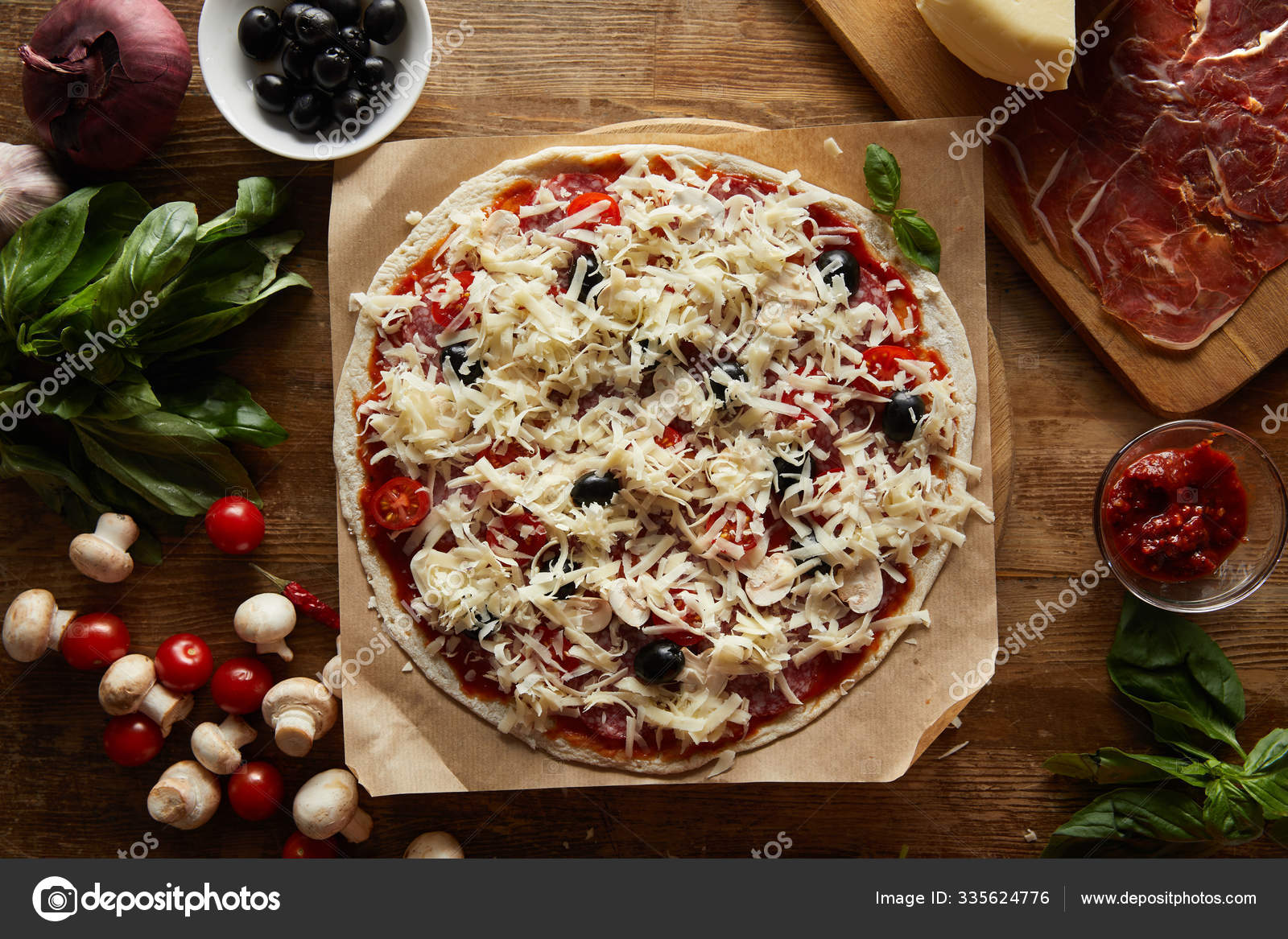Top View Pizza Parchment Paper Parmesan Vegetables Olives Salami Wooden