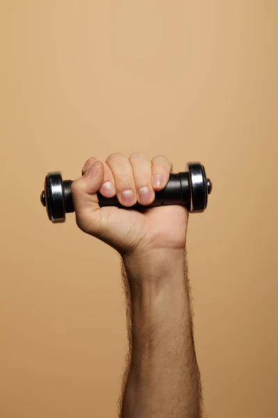 Beskärd Över Mannen Håller Hanteln Isolerad Beige — Stockfoto