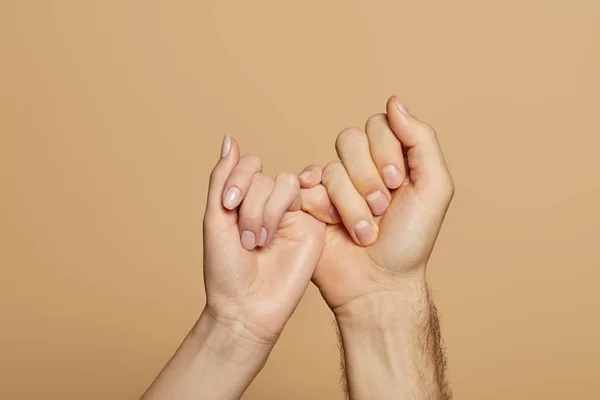 Vista Cortada Homem Mulher Segurando Pequenos Dedos Isolados Bege — Fotografia de Stock