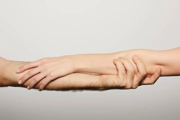 Visão Cortada Homem Mulher Mãos Dadas Isoladas Branco — Fotografia de Stock