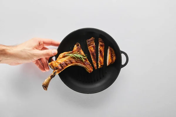 Top View Man Holding Frying Pan Tasty Ribeye Steak White — Stock Photo, Image