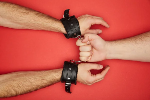 Cropped View Man Holding Handcuffs Man Isolated Red — Stock Photo, Image