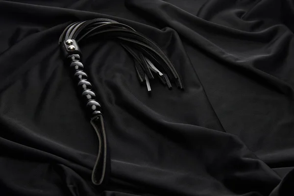 Leather Flogging Whip Black Textile Background — 스톡 사진