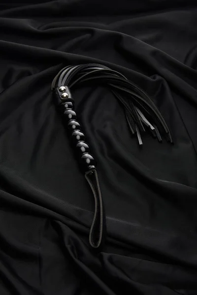 Leather Flogging Whip Black Textile Background — Stock Photo, Image