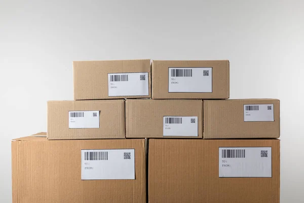 Cardboard Packages Barcodes Codes Cards Isolated Grey — Stock Photo, Image