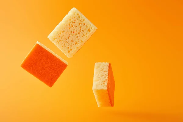 Falling Sponges House Cleaning Isolated Orange — Stock Photo, Image