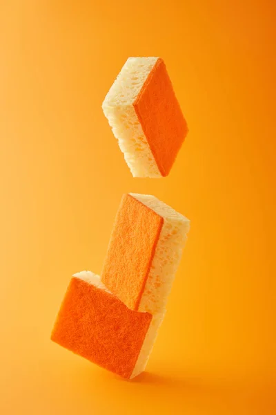Falling Sponges Dish Washing Orange — Stock Photo, Image