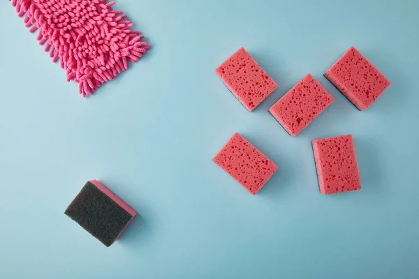 Top View Pink Cleaning Supplies Blue — Stock Photo, Image