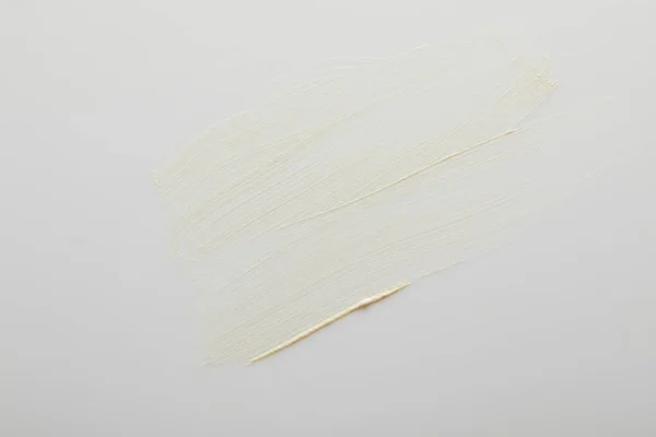 Top View Tone Cream Brush Strokes Grey Background — Stock Photo, Image