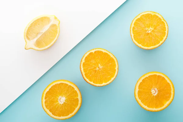 Top View Cut Oranges Lemon Half White Blue Background — Stock Photo, Image