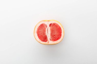 Top view of grapefruit half on white background clipart