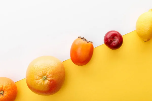 Top View Orange Grapefruit Lemon Persimmon Apple Yellow White Background — Stock Photo, Image