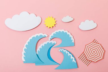 Top view of paper cut summer beach on pink background clipart