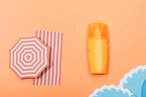 Top View Dispenser Bottle Sunscreen Paper Cut Sea Waves Orange — Stock Photo, Image
