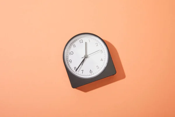 Top View Clock Peach Background — Stock Photo, Image