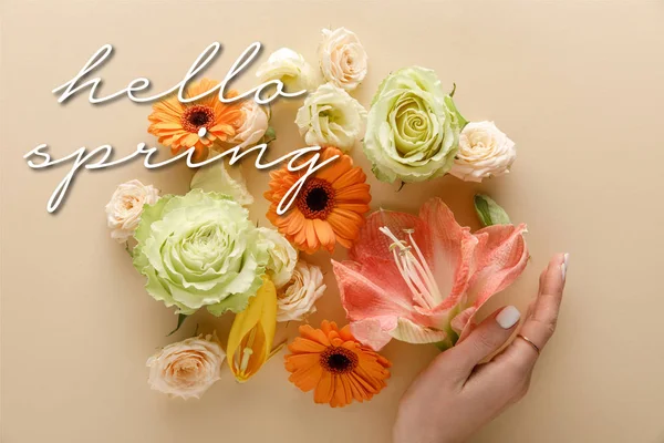 Top View Spring Flowers Female Hand Beige Background Hello Spring — Stock Photo, Image