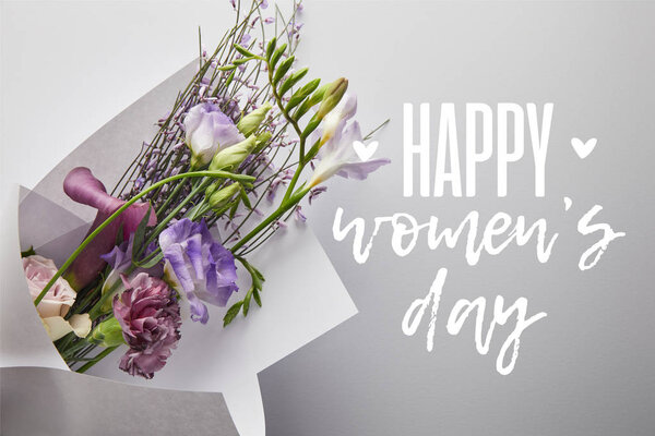 top view of violet bouquet wrapped in paper on white background, happy womens day illustration 