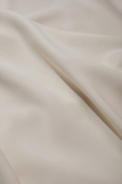 close up view of white soft and crumpled silk cloth clipart