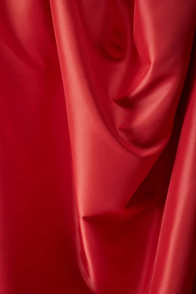 Närbild Röd Mjuk Och Vågigt Silke Texturerad Trasa — Stockfoto