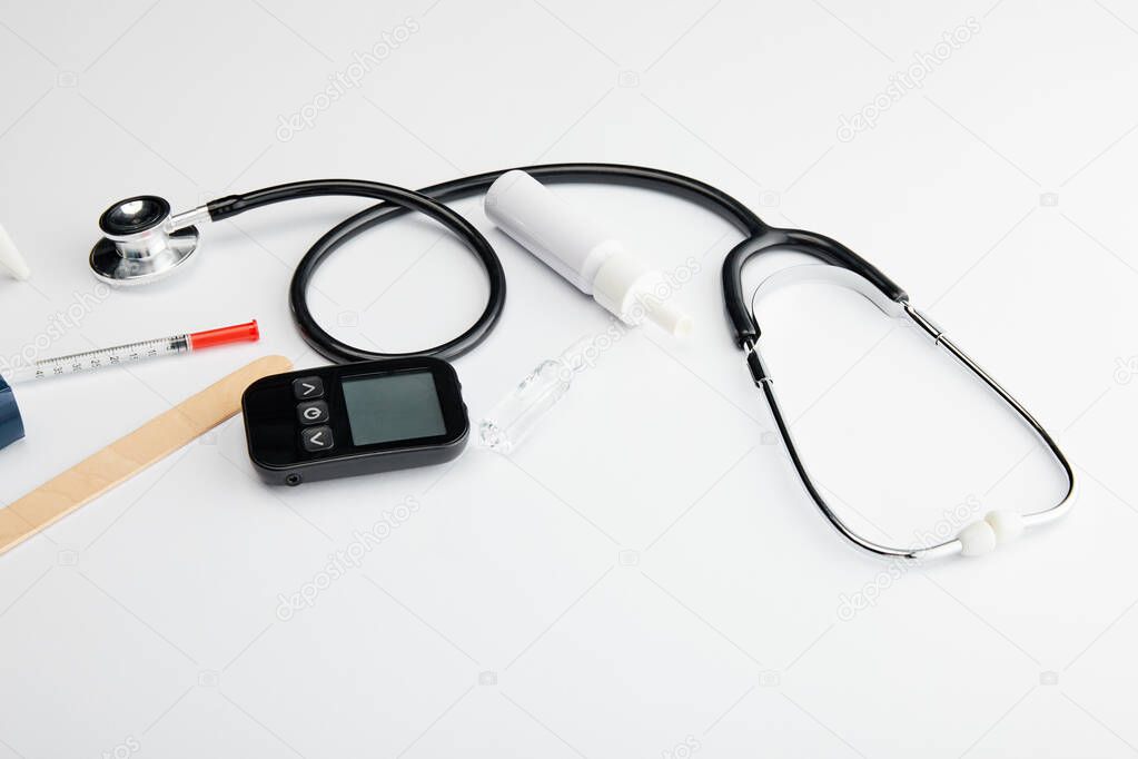 High angle view of medical objects on white background