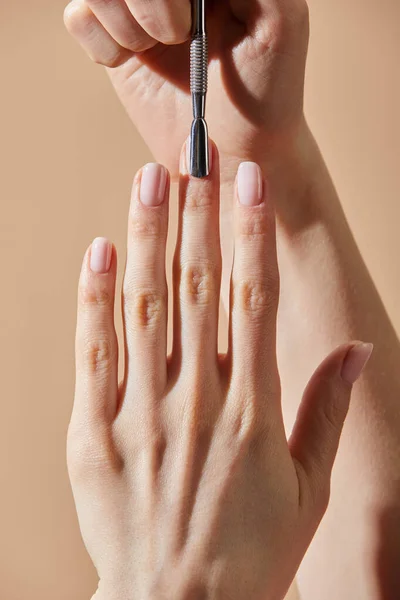 Partial View Woman Doing Manicure Cuticle Pusher Isolated Beige — Stock Photo, Image