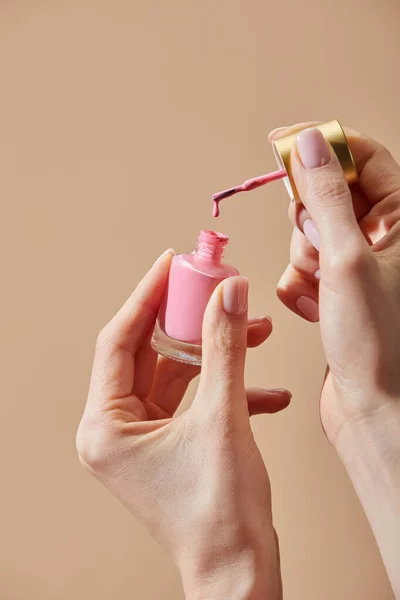 Cropped View Woman Holding Opened Bottle Pink Nail Polish Isolated — Stock Photo, Image