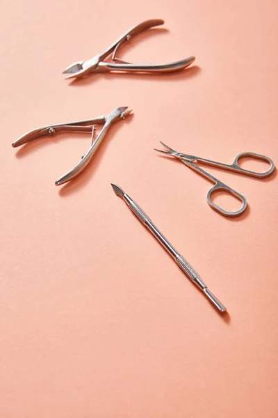 High Angle View Manicure Instruments Coral Background — Stock Photo, Image