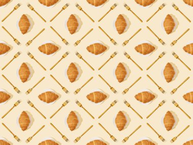top view of golden forks and croissants on beige, seamless background pattern clipart