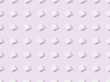 top view of lump sugar on violet, seamless background pattern clipart