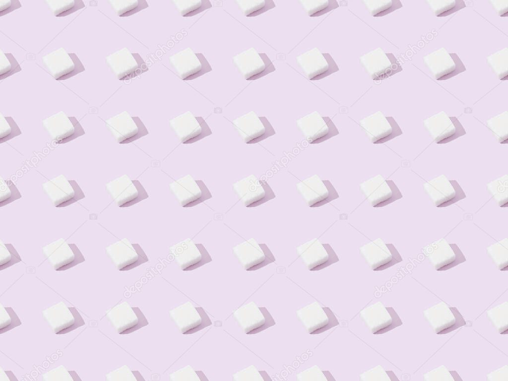 top view of lump sugar on violet, seamless background pattern