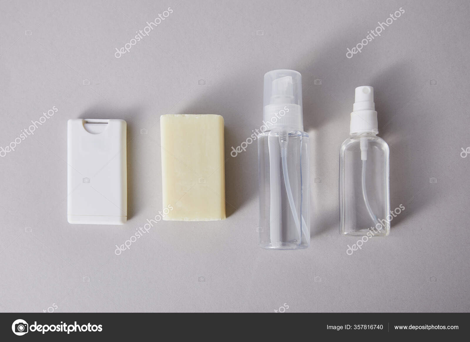 Flat Lay Hand Sanitizer Spray Bottles Antibacterial Soap Grey
