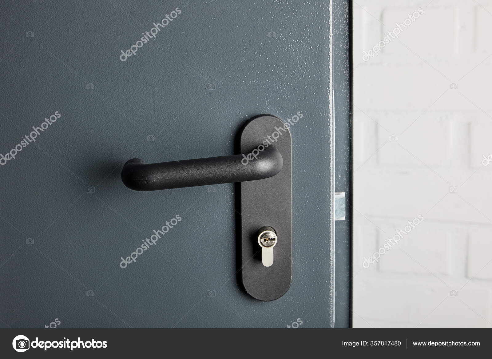 Clean Metal Door Black Handle Disinfection Stock Photo by