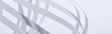 close up view of paper stripes isolated on white, panoramic shot clipart