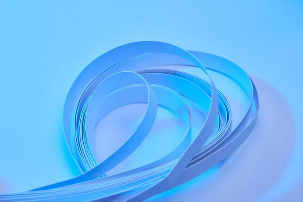 Close View Curved Colorful Paper Stripes Neon Blue Background — Stock Photo, Image